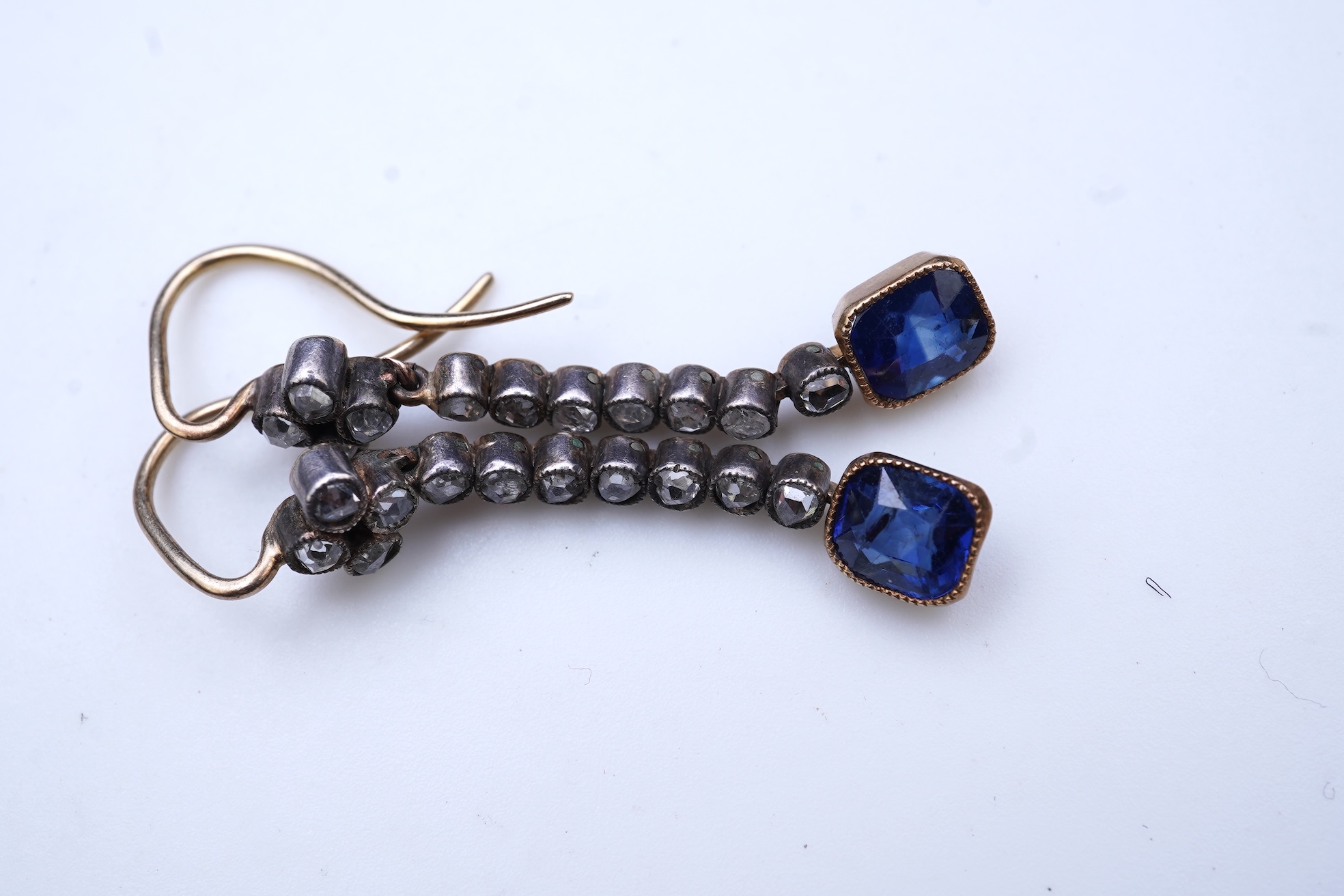A pair of sapphire and diamond earrings, early 20th century